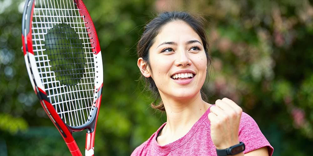 Tennis team celebrating success with improved team management